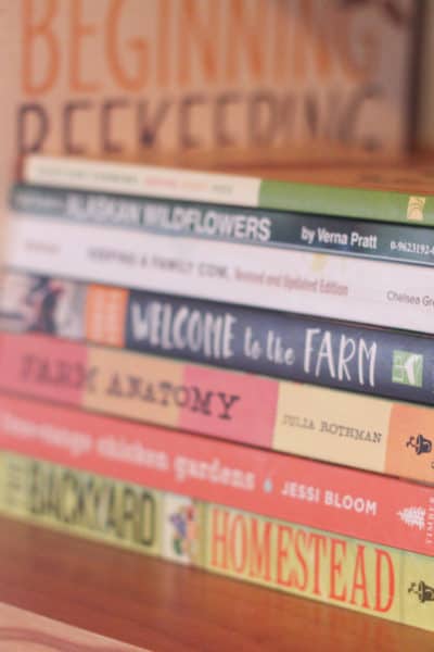 Stack of books-homesteading books for spring planning
