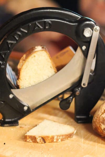 Antique bread cutter log home kitchen essentials
