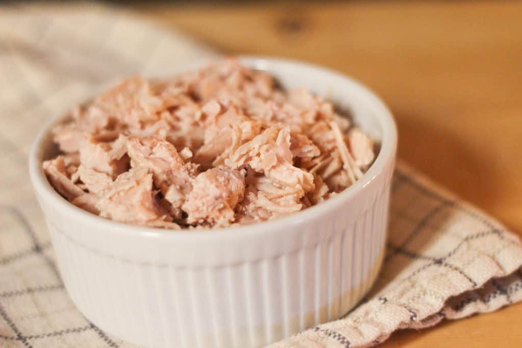 A bowl full of pressure canned turkey meat