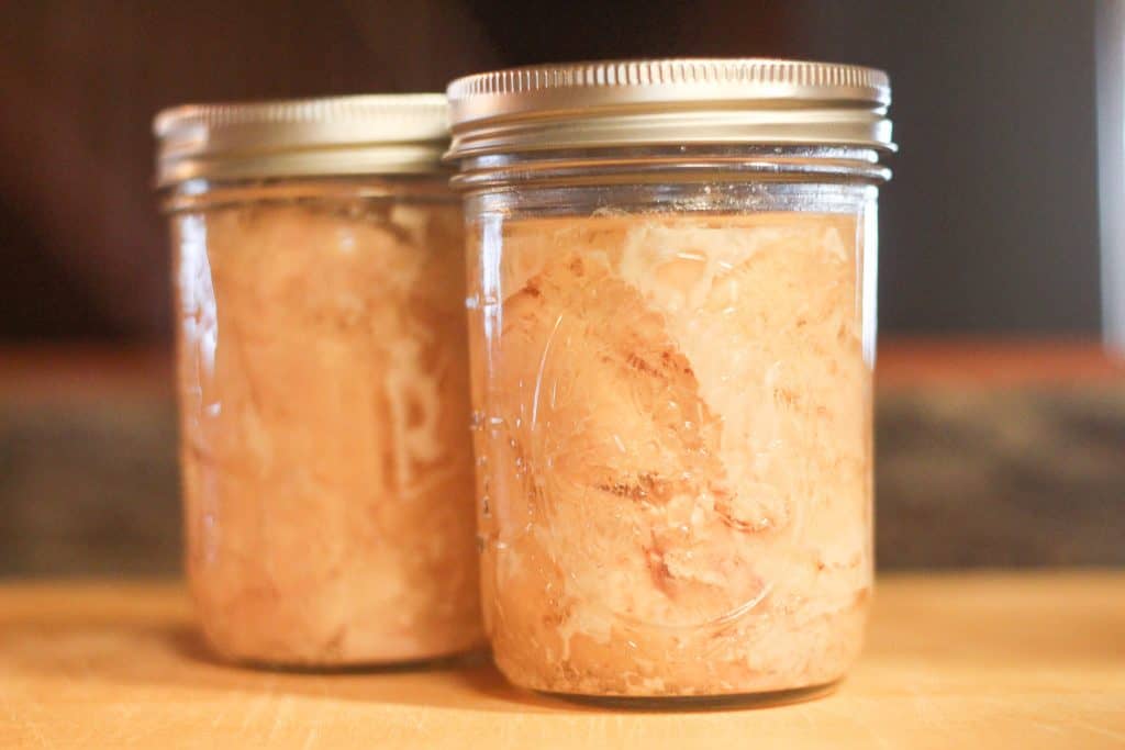Two glass canning jars of turkey meat