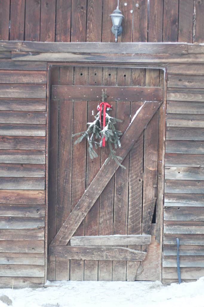 barn door with Christmas decoration