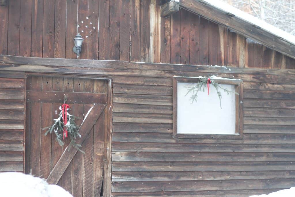 a barn decorated for Christmas