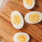 Hard boiled eggs cut open to show the yolk