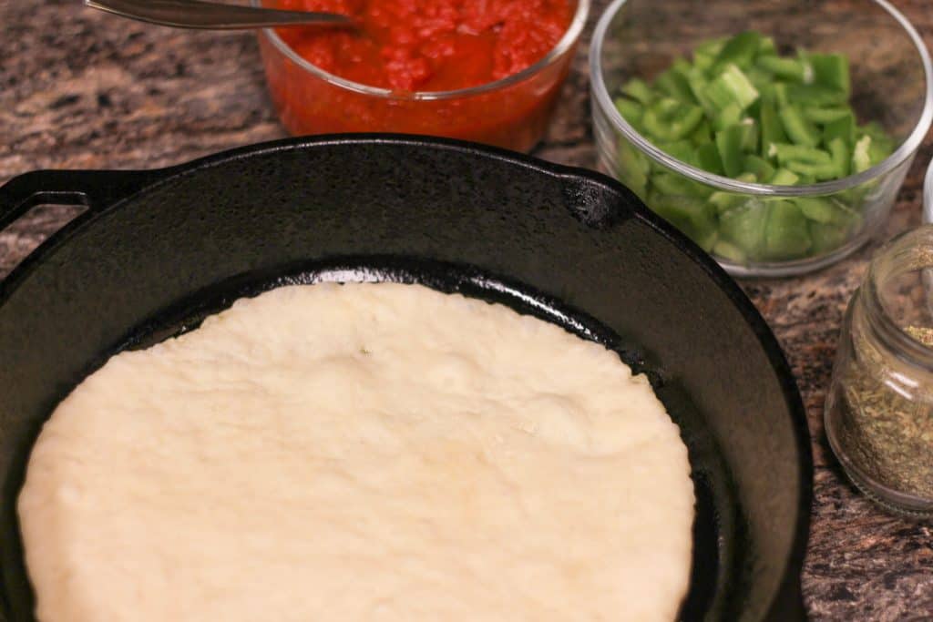 Pizza crust in a cast iron skillet