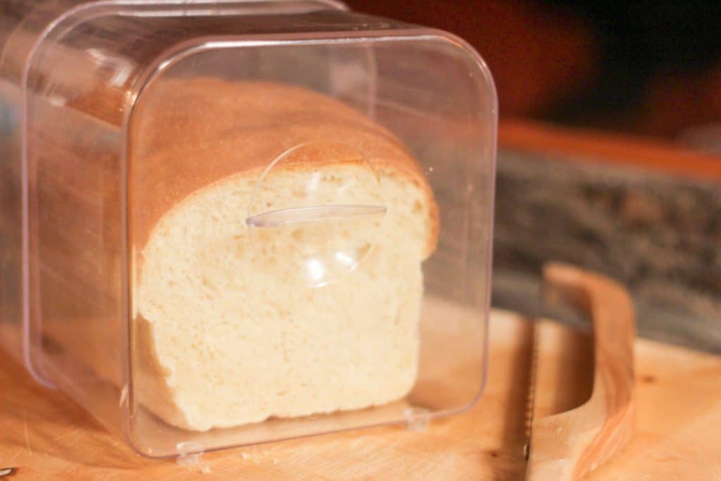 A loaf of bread in a bread box-how to store homemade sourdough bread