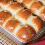 Two baked loaves of sourdough brioche