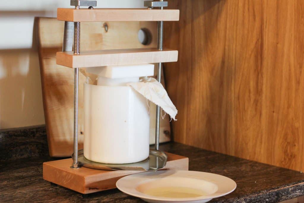 A fully assembled cheese press