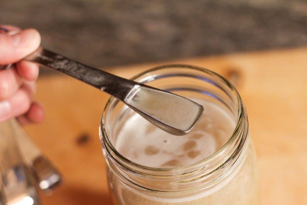 A teaspoon measuring some honey b healthy