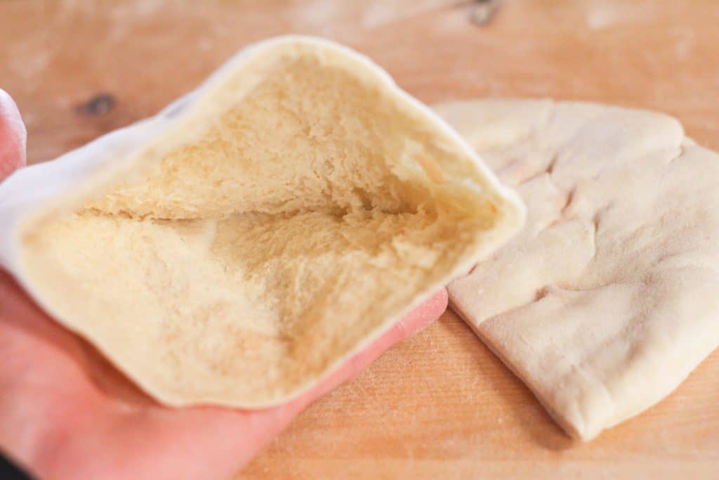 A pita opened to show the pocket