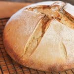 Sourdough boule recipe sitting on a cooling rack