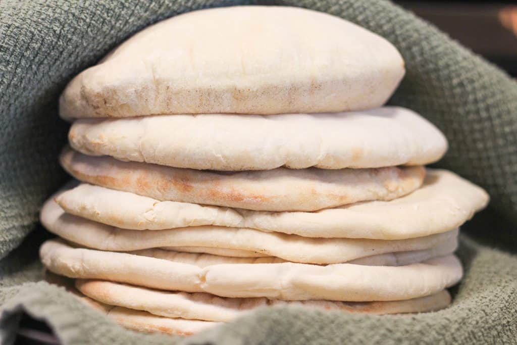 A stack of several sourdough pita breads